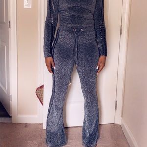 Jazzy turtleneck track suite w/wide leg pant.